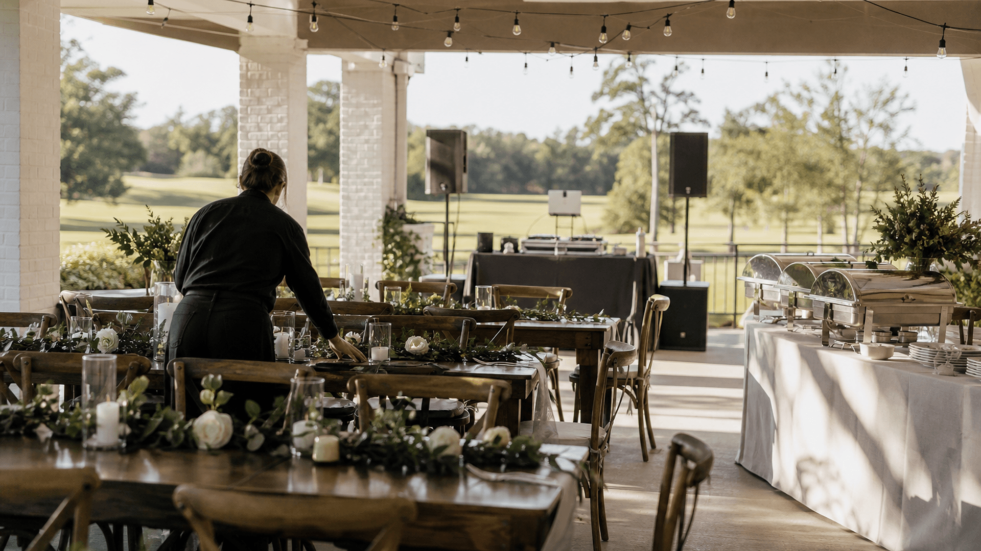 The covered pavilion and patio at the golf clubhouse set for a catered afternoon celebration